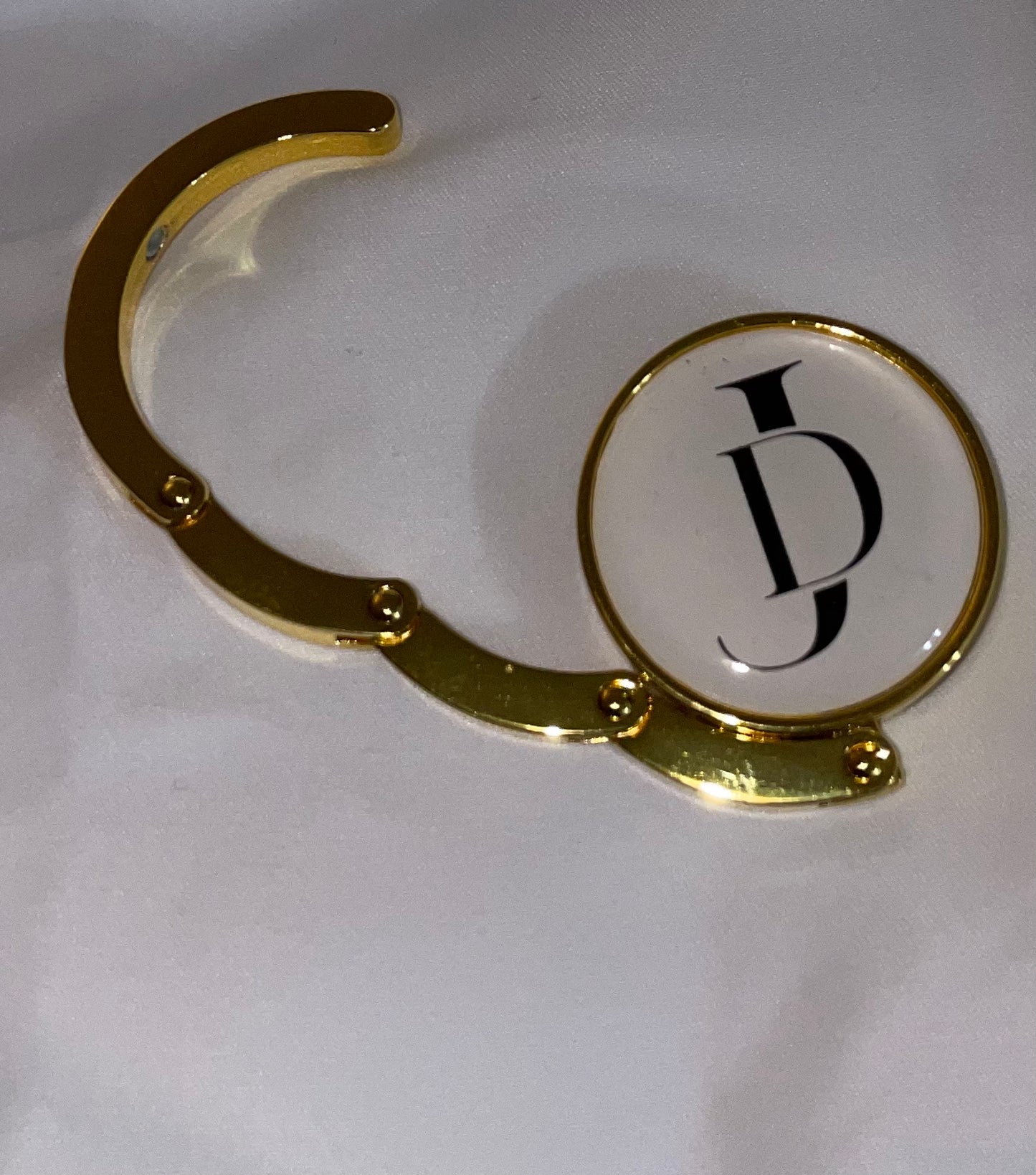 Logo purse hanger